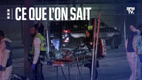 Des secours israéliens transportant une victime de l'attaque survenue près d'une synagogue à Jérusalem-Est, le 27 janvier 2023.