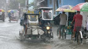 A Manille, capitale des Philippines, touchée elle aussi par le typhon Utor, le 12 août 2013.