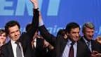 François Fillon (au centre) a assuré, lors d'un meeting de soutien au candidat UMP en Pays de la Loire Christophe Béchu (à gauche) à Nantes, qu'il ne cédait pas au pessimisme et a appelé les électeurs à faire mentir les sondages qui promettent à la gauche