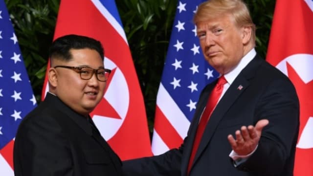 Le dirigeant nord-coréen Kim Jong Un et le président des Etats-Unis Donald Trump, le 12 juin 2018 à Singapour