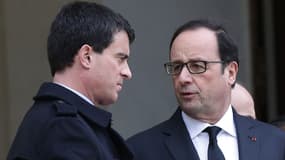 La popularité de François Hollande (D) et Manuel Valls (G) est en hausse pour le 3e mois consécutif.