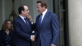 La rencontre d'octobre 2014 entre François Hollande et Arnold Schwarzenegger ne se renouvellera pas mardi.
