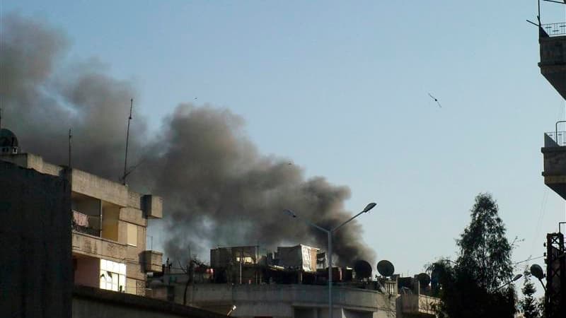 Dans le quartier d'Al Qousour à Homs. a Chine a appelé lundi le gouvernement syrien et l'opposition à respecter le calendrier de cessez-le-feu prévu par le plan de paix de l'émissaire de l'Onu et de la Ligue arabe, Kofi Annan. /Photo prise le 8 avril 2012