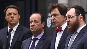 Le président François Hollande (2e g.), ce mardi devant le Musée juif de Belgique à Bruxelles.
