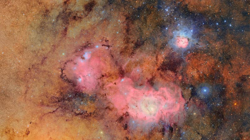 Cette image non datée publiée le 20 juin 2025 montre une combinaison de 678 images distinctes prises par l'observatoire Vera C. Rubin du NSF-DOE en un peu plus de sept heures d'observation. On y voit la nébuleuse Trifide (en haut à droite) et la nébuleuse de la Lagune, qui se trouvent à plusieurs milliers d'années-lumière de la Terre.