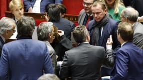 Olivier Dussopt et des députés à l'Assemblée nationale le 13 février 2023