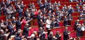 Double ovation pour Laurent Fabius à l'Assemblée après le succès de la COP21
