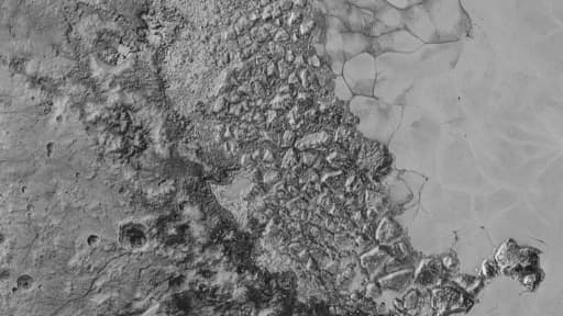 Image fournie par la Nasa, Johns Hopkins University Applied Physics Laboratory et le Southwest Research Institute, montrant la surface de Pluton Image fournie par la Nasa, Johns Hopkins University Applied Physics Laboratory et le Southwest Research Institute, montrant la surface de Pluton