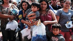 Des migrants à la frontière entre les Etats-Unis et le Mexique, en juin 2018.