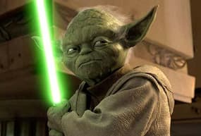 Yoda et son célèbre sabre laser.