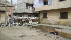 Dans un quartier de Homs. Le Croissant-Rouge syrien a commencé à évacuer vendredi des femmes et des enfants de Bab Amro, ce quartier de Homs soumis à d'intenses bombardements depuis trois semaines, tandis que la pression internationale s'est accentuée à l