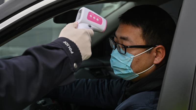 Un contrôle à Wuhan, le 20 janvier 2020.