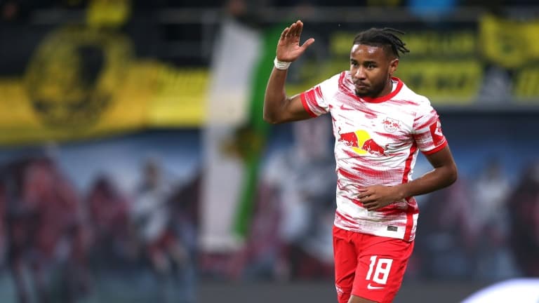 La joie du milieu de terrain français de Leipzig Christopher Nkunku, arpès avoir ouvert le score à domicile contre le Borussia Dormtund, lors de la 11e journée de Bundesliga, le 7 novembre 2021