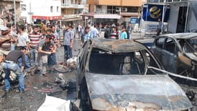 L'explosion de voitures piégées a fait plus de 30 morts et des dizaines de blessés samedi à Reyhanli dans le sud-est de la Turquie, près de la frontière syrienne. /Photo prise le 11 mai 2013/REUTERS/Ihlas News Agency