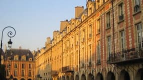 La place des Vosges à Pariq