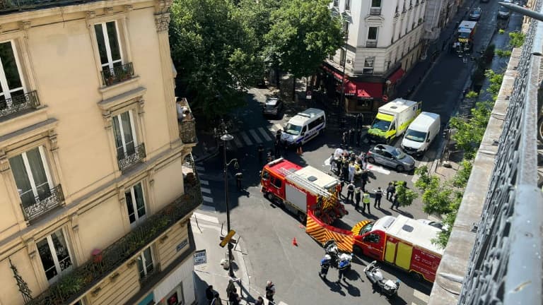 Des véhicules de pompiers sur le site où trois policiers ont tiré sur une voiture, tuant la passager et blessant grièvement le conducteur, le 4 juin 2022 dans le nord de Paris