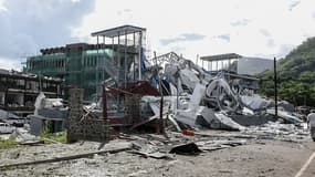 Un bâtiment détruit après une explosion dans la zone industrielle de la Providence, aux Seychelles, le 7 décembre 2023