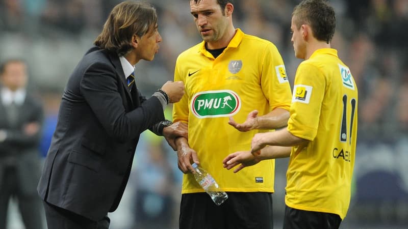 Régis Brouard et ses joueurs de Quevilly, en 2012