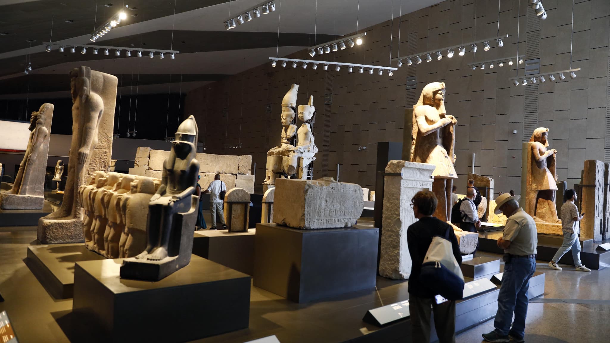 The Grand Egyptian Museum displays thousands of artifacts from prehistoric, pharaonic and Roman times, including the gold treasures of King Tutankhamun, whose tomb was discovered in 1922. The Grand Egyptian Museum displays thousands of artifacts from prehistoric, pharaonic and Roman times, including the gold treasures of King Tutankhamun, whose tomb was discovered in 1922.