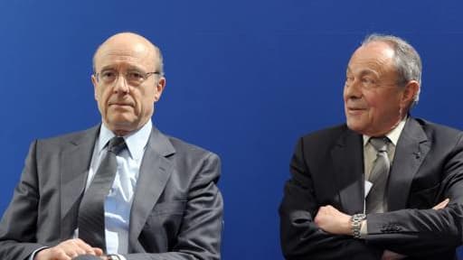 Alain Juppé (à gauche) et Michel Rocard (à droite) co-présidaient tous les deux le conseil de surveillance du Programme d'investissement d'avenir.