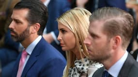 Donald Trump Jr, Ivanka Trump et Eric Trump (de gauche à droite) lors d'une conférence de presse de leur père Donald Trump à Londres le 4 juin 2019