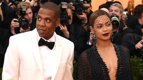 Jay-Z, ici accompagné de sa femme Beyoncé, a acheté mercredi la marque de champagne Armand de Brignac.