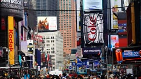 Time Square, à New York. Quelque 52 millions de visiteurs ont arpenté en 2012 les rues de New York City, qui bat pour la troisième année consécutive son record en terme de fréquentation touristique. /Photo prise le 31 décembre 2012/REUTERS/Joshua Lott