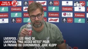 Liverpool : Les fans de Liverpool "pas assez bêtes" pour la parano du coronavirus, juge Klopp