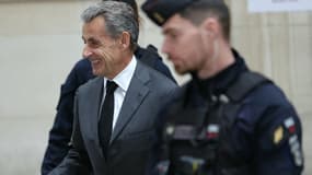 Nicolas Sarkozy est arrivé tout sourire avant son procès en appel dans l'affaire Bygmalion