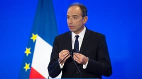 Jean-François Copé donnant une conférence de presse au QG de l'UMP à Paris, le 8 janvier 2014.