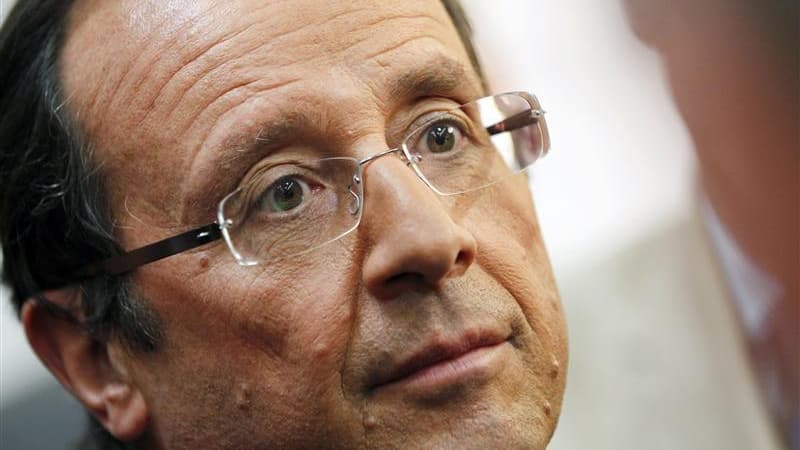 François Hollande a accusé jeudi le président Nicolas Sarkozy d'orchestrer la campagne de dénigrement le concernant, qui s'est intensifiée ces derniers jours. /Photo prise le 29 septembre 2011/REUTERS/Régis Duvignau