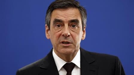 François Fillon a confirmé samedi sa décision de se présenter aux élections législatives qui suivront la présidentielle de 2012 à Paris. /Photo d'archives/REUTERS/Eric Gaillard