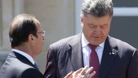 Hollande et Porochenko, lors des célébrations du D-Day, début juin 1014.