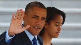 Barack Obama et sa fille Malia, avant de s'envoler pour l'Afrique.