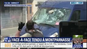 1er-mai à Paris: une camionnette est prise pour cible par des casseurs