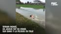Terrain inondé, un joueur fait du crawl sur (dans ?) la pelouse en Italie