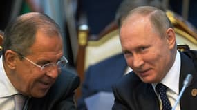 Sergei Lavrov (g) et Vladimir Poutine (d)