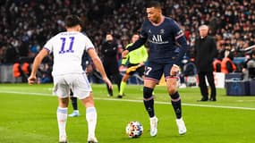 Marco Asensio et Kylian Mbappé lors d'un match de Ligue des champions entre le PSG et le Real Madrid, le 15/02/2022