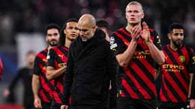 Pep Guardiola et Erling Haaland après le match nul de Manchester City en Allemagne, 22 février 2023