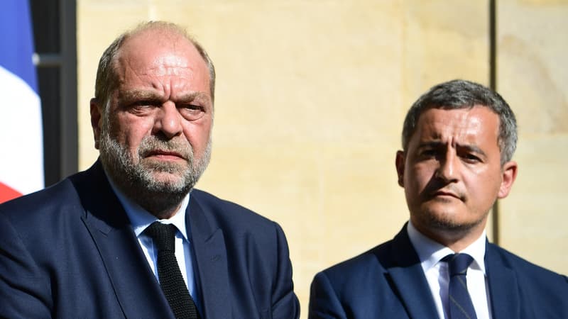 Le ministre de la Justice, Éric Dupond-Moretti, et le ministre de l'Intérieur, Gerald Darmanin devant le ministère de la Justice, à Paris, le 25 juillet 2022.