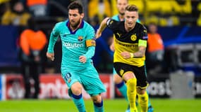 Lionel Messi et Marco Reus lors d'un match Dortmund-Barça, au Signal Iduna Park le 17 septembre 2019