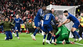 Les joueurs du PSG face à Liverpool, à Anfield le 11 mars 2025