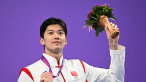 Wang Shun avec la médaille de bronze décrochée sur 400m 4 nages durant les Jeux asiatiques, le 26 septembre 2023