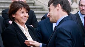 Lors du déplacement à Lille de Nicolas Sarkozy, le chef de l'Etat et la première secrétaire du Parti socialiste, Martine Aubry, se sont livrés jeudi à un duel sans concession à cent jours du premier tour de l'élection présidentielle. /Photo prise le 12 ja