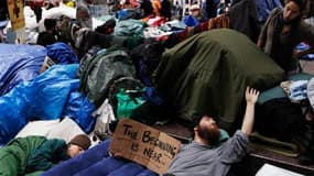 Les manifestants du mouvement Occupy Wall Street étaient déterminés vendredi à empêcher le nettoyage du campement improvisé où ils se sont installés il y a près d'un mois dans le district new-yorkais de Lower Manhattan, laissant présager une probable conf