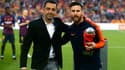 Xavi et Lionel Messi