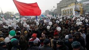 Manifestation de plusieurs dizaines de milliers de personnes à Moscou qui réclament des élections équitables et davantage de libertés politiques à un mois du premier tour de la présidentielle que Vladimir Poutine aborde en grand favori. /Photo prise le 4