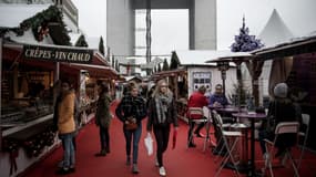 Sur le marché de Noël de la Défense, les commerçants font grise mine.