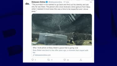 L'homme en uniforme assis près de la tombe de Beau Biden.