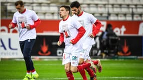 Les joueurs du Stade de Reims avant un match contre l'OL, le 12 mars 2021
